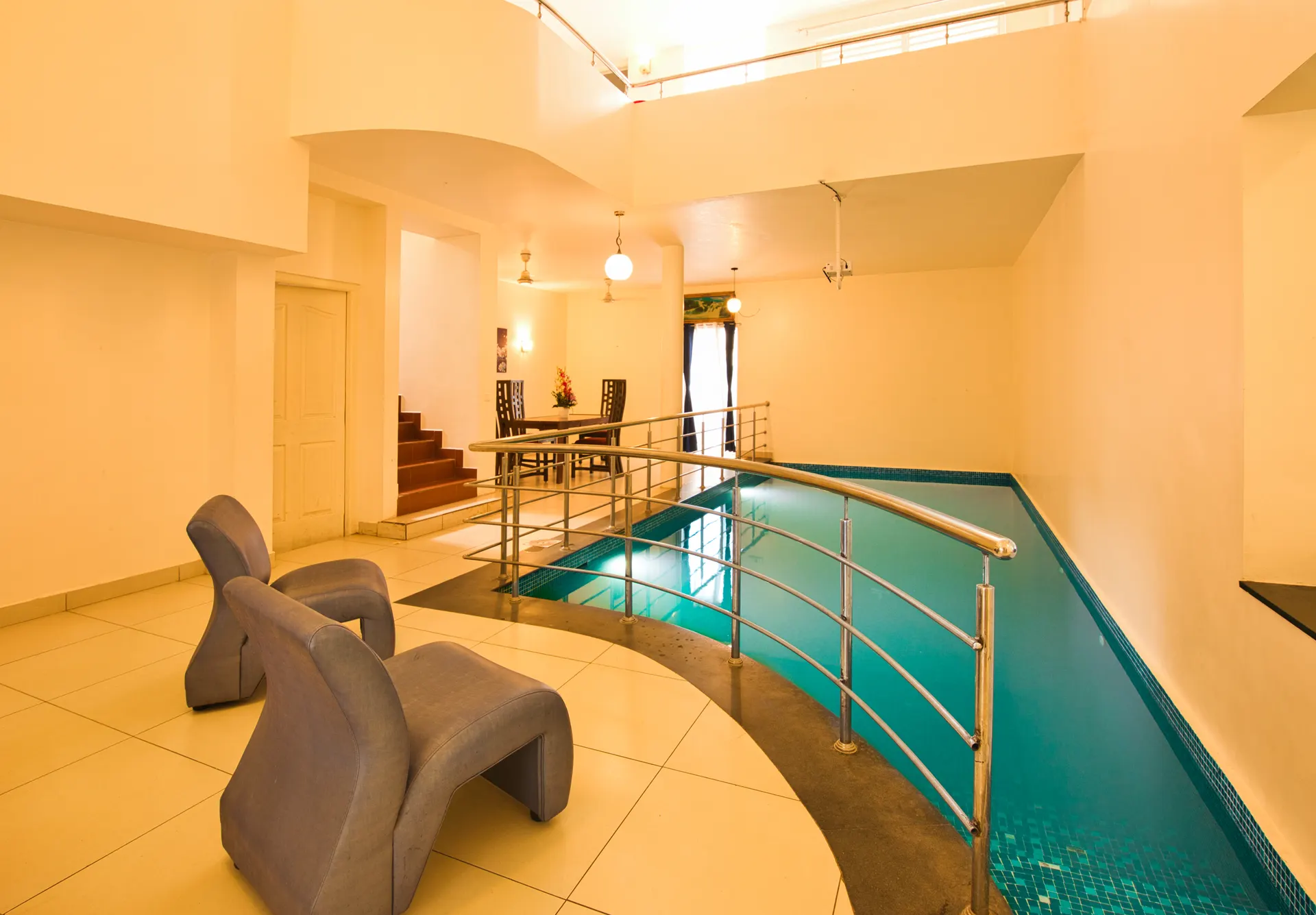 The covered indoor pool at ECR Diamond, with the projector wall beyond